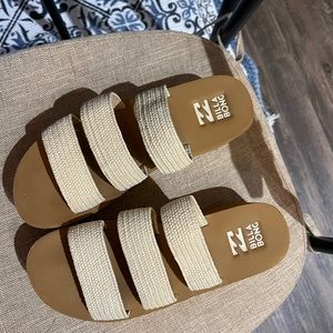 Cute pair of platform billabong sandals.
